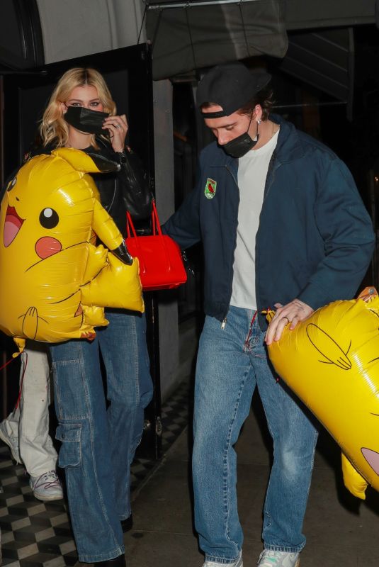NICOLA PELTZ and Brooklyn Beckham at Craig