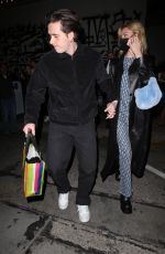 NICOLA PELTZ and Brooklyn Beckham Leaves Craig