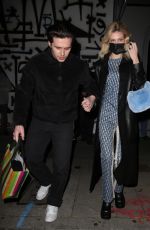 NICOLA PELTZ and Brooklyn Beckham Leaves Craig
