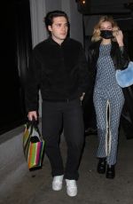 NICOLA PELTZ and Brooklyn Beckham Leaves Craig
