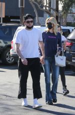NICOLA PELTZ and Brooklyn Beckham Out Shopping on Abbot Kinney in Venice Beach 02/11/2022