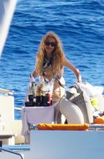 PAULINA RUBIO and Eugenio Lopez Alonso Out in St.Barths 02/08/2022