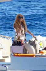 PAULINA RUBIO and Eugenio Lopez Alonso Out in St.Barths 02/08/2022