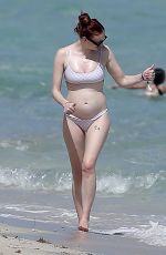 Pregnant SOPHIE TURNER in Bikni on the Beach in Miami 02/27/2022
