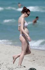 Pregnant SOPHIE TURNER in Bikni on the Beach in Miami 02/27/2022