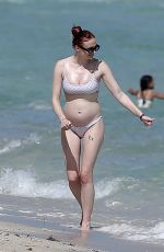 Pregnant SOPHIE TURNER in Bikni on the Beach in Miami 02/27/2022