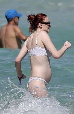 Pregnant SOPHIE TURNER in Bikni on the Beach in Miami 02/27/2022
