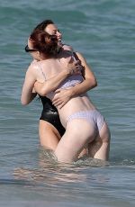 Pregnant SOPHIE TURNER in Bikni on the Beach in Miami 02/27/2022