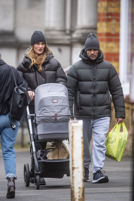 ROSIE HUNTIGNTON-WHITELEY and Jason Statham Out with Her Daughter in London 02/26/2022