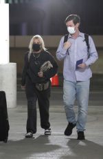 TORI SPELLING at LAX Airport in Los Angeles 02/13/2022