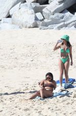 VANESSA HUDGENS and GG MAGREE in Bikinis at a Beach in Cabo San Lucas 02/01/2022