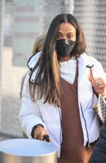 ZOE SALDANA Arrives at JFK Airport in New York 02/26/2022