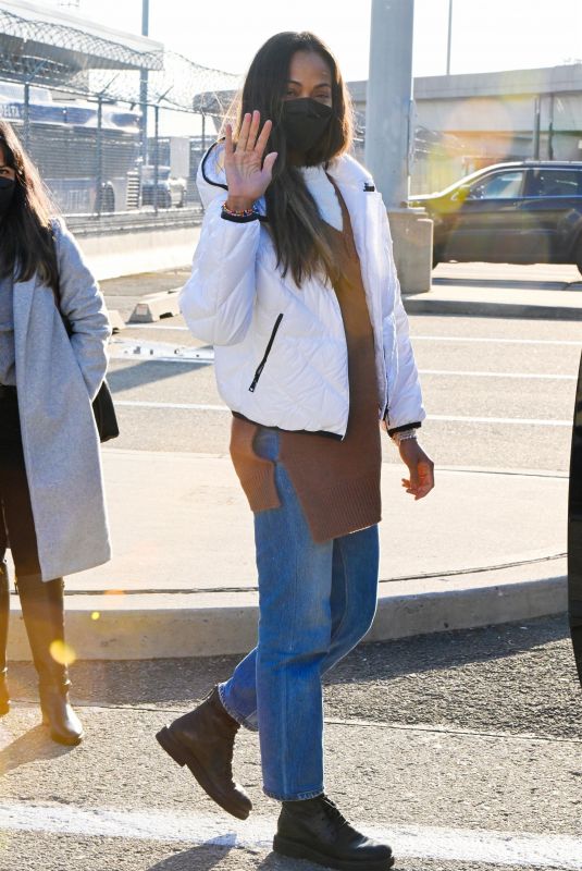ZOE SALDANA Arrives at JFK Airport in New York 02/26/2022