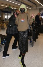 ALEX WEK at LAX Airport in Los Angeles 03/09/2022