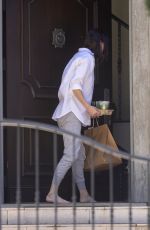 ALEXANDRA DADDARIO Gets Food and Drinks Delivered to Her Home in Los Angeles 03/23/2022