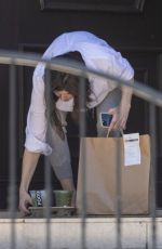 ALEXANDRA DADDARIO Gets Food and Drinks Delivered to Her Home in Los Angeles 03/23/2022
