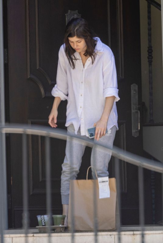 ALEXANDRA DADDARIO Gets Food and Drinks Delivered to Her Home in Los Angeles 03/23/2022