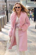AMANDA HOLDEN in a Pink Fur Lined Coat Arrives at Heart Radio in London 03/25/2022