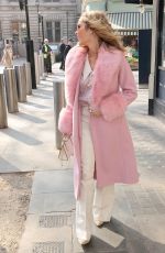 AMANDA HOLDEN in a Pink Fur Lined Coat Arrives at Heart Radio in London 03/25/2022