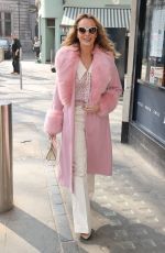 AMANDA HOLDEN in a Pink Fur Lined Coat Arrives at Heart Radio in London 03/25/2022