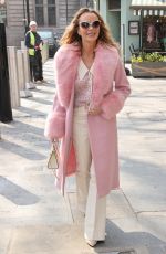AMANDA HOLDEN in a Pink Fur Lined Coat Arrives at Heart Radio in London 03/25/2022