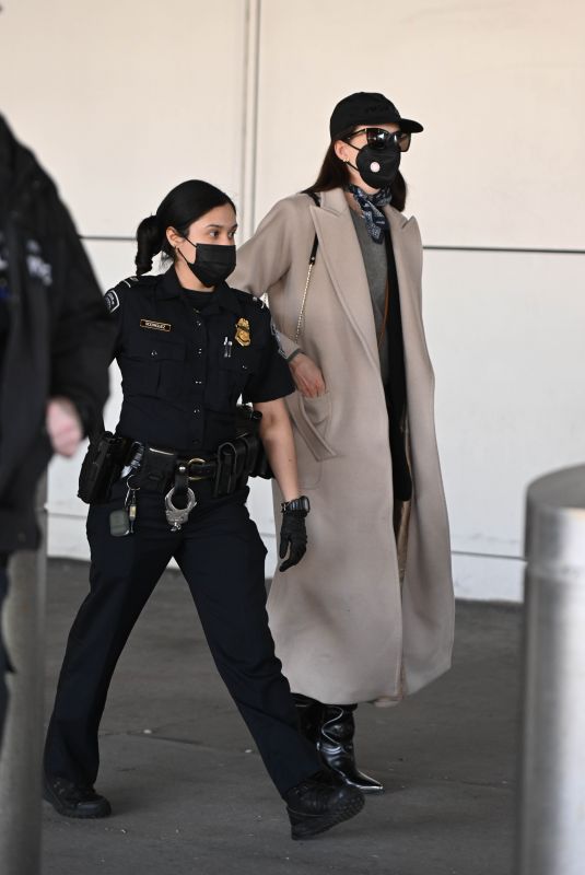 ANNE HATHAWAY at JFK Airport in New York 03/03/2022
