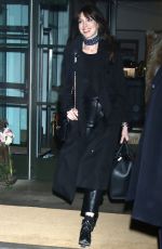 ANNE HATHAWAY Heading to a Press Tour for WeCrashed in New York 03/09/2022