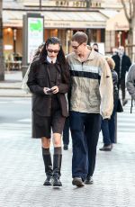 BELLA HADID and Marc Kalman Leaves Cafe de Flore in Paris 03/07/2022