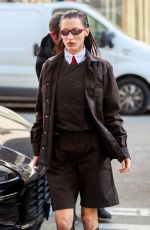 BELLA HADID and Marc Kalman Leaves Cafe de Flore in Paris 03/07/2022