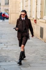 BELLA HADID and Marc Kalman Leaves Cafe de Flore in Paris 03/07/2022
