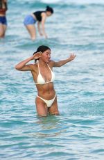 BONNIE MUELLER and Cedric Gervais at a Beach in Miami 03/20/2022