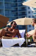 BONNIE MUELLER and Cedric Gervais at a Beach in Miami 03/20/2022