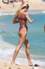 CANDICE SWANEPOEL in Bikini at a Beach in Miami 03/19/2022