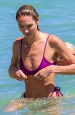 CANDICE SWANEPOEL in Bikini at a Beach in Miami 03/19/2022