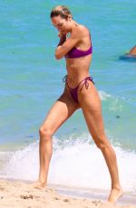 CANDICE SWANEPOEL in Bikini at a Beach in Miami 03/19/2022
