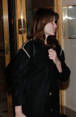 CARLA BRUNI Arrives at Hotel Bristol in Paris 03/19/2022