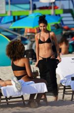 CHANTEL JEFFRIES in a Black Bikini at a Beach of Setai Hotel in Miami 03/20/2022