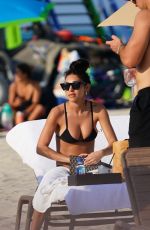 CHANTEL JEFFRIES in a Black Bikini at a Beach of Setai Hotel in Miami 03/20/2022