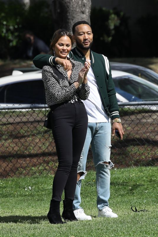 CHRISSY TEIGEN and John Legend Arrives at a Park in Beverly Hills 03/05/2022