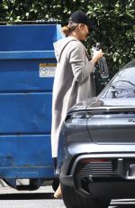 CHRISSY TEIGEN Arrives Back Home in Culver City 03/15/2022