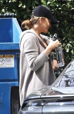 CHRISSY TEIGEN Arrives Back Home in Culver City 03/15/2022
