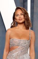 CHRISSY TEIGEN at 2022 Vanity Fair Oscar Party in Beverly Hills 03/27/2022
