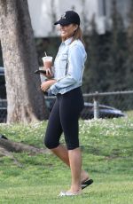 CHRISSY TEIGEN at a Park in Los Angeles 03/20/2022