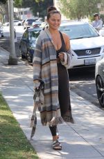 CHRISSY TEIGEN Out in Beverly Hills 03/26/2022