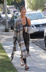 CHRISSY TEIGEN Out in Beverly Hills 03/26/2022