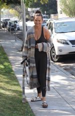CHRISSY TEIGEN Out in Beverly Hills 03/26/2022