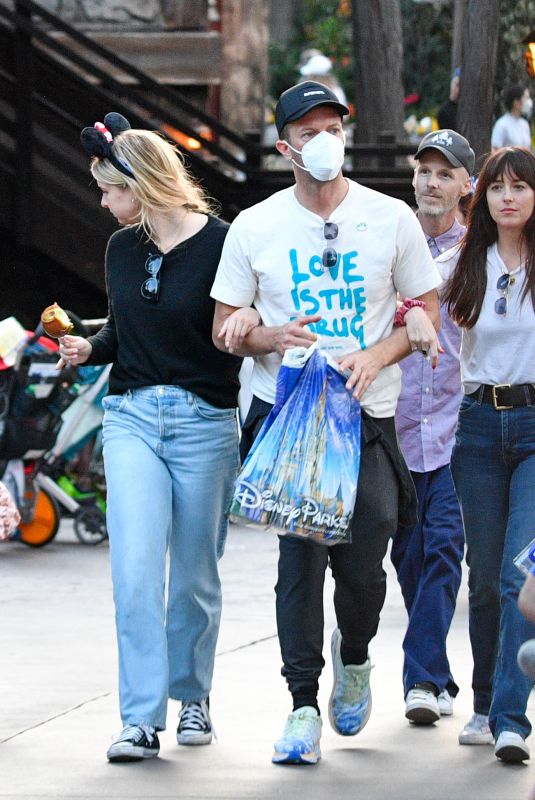 DAKOTA JOHNSON Out with Friends at Disneyland in Anaheim 03/02/2022