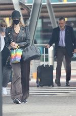 DELTA GOODREM Arrives at Airport in Perth 03/21/2022