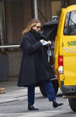 DIANNA AGRON Hailing a Cab on Madison Avenue in New York 03/30/2022