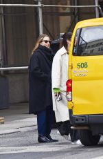 DIANNA AGRON Hailing a Cab on Madison Avenue in New York 03/30/2022